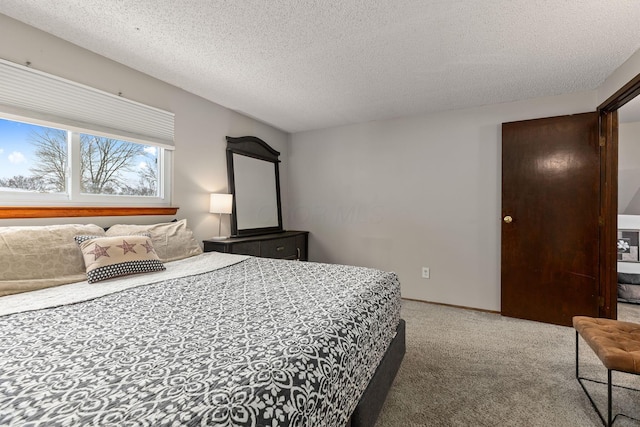 bedroom with carpet flooring and a textured ceiling