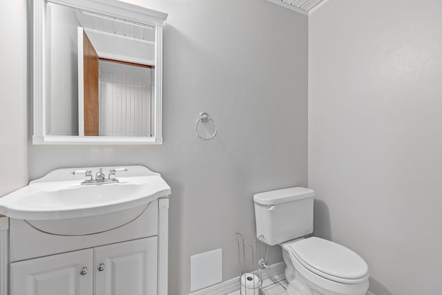 bathroom with vanity and toilet