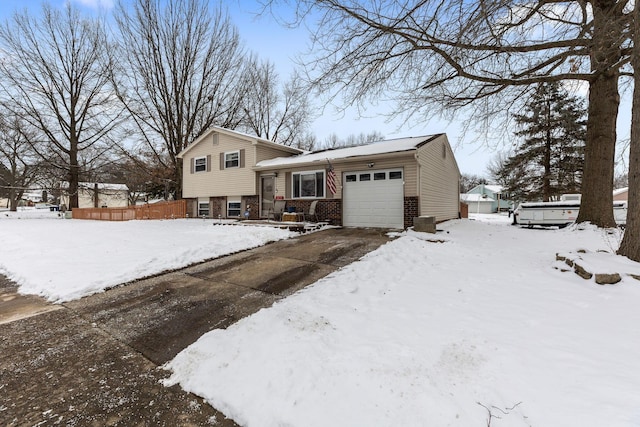 view of front of property featuring a garage