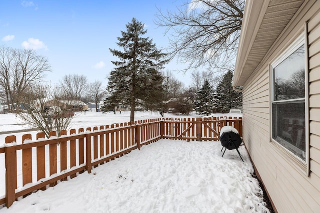 view of snow covered deck