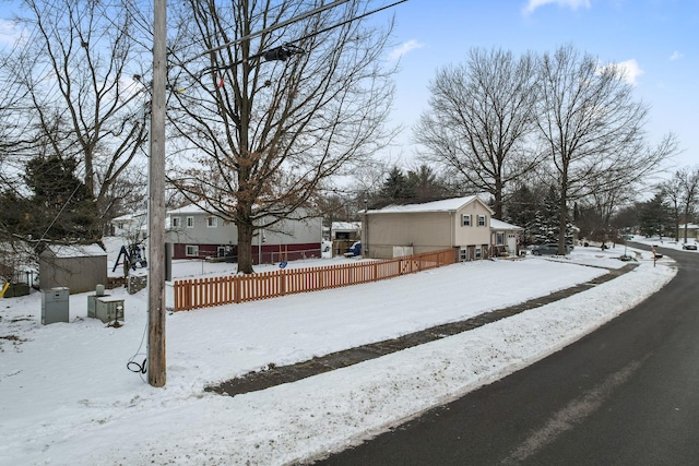 view of yard covered in snow