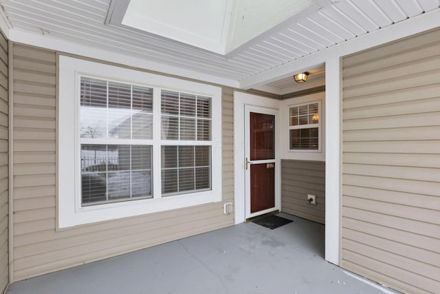 property entrance with a patio area