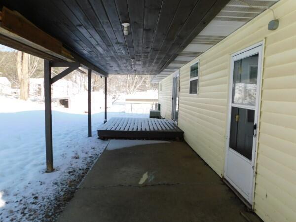 view of snow covered patio