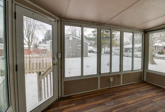 unfurnished sunroom featuring a healthy amount of sunlight