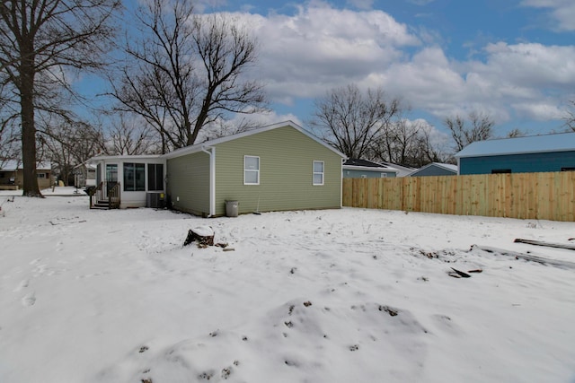 view of snow covered house