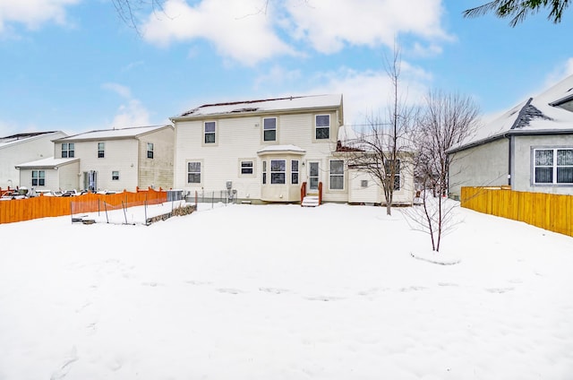 view of snow covered property