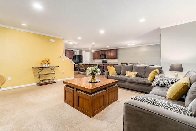 carpeted living room featuring crown molding