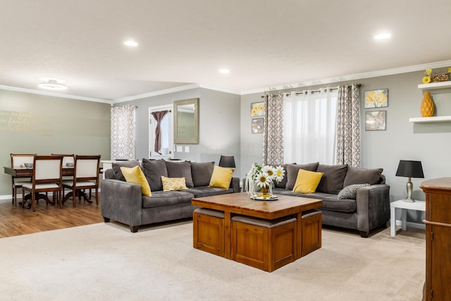 carpeted living room with crown molding