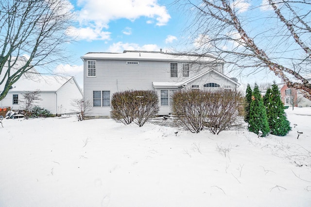 view of snow covered property