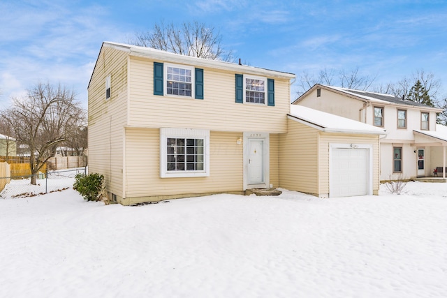 view of front of property featuring a garage