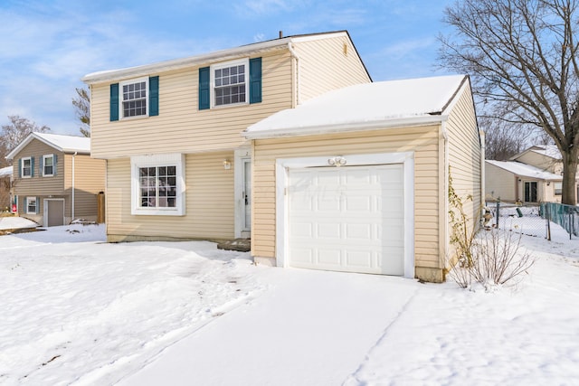 view of front of property with a garage