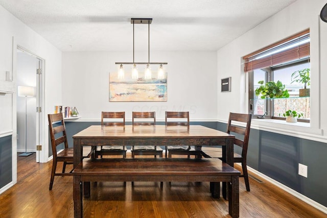 dining area featuring hardwood / wood-style floors