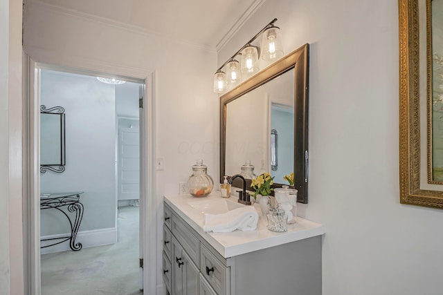 bathroom featuring vanity and ornamental molding