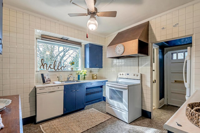 kitchen with ornamental molding, custom range hood, tile walls, and white appliances