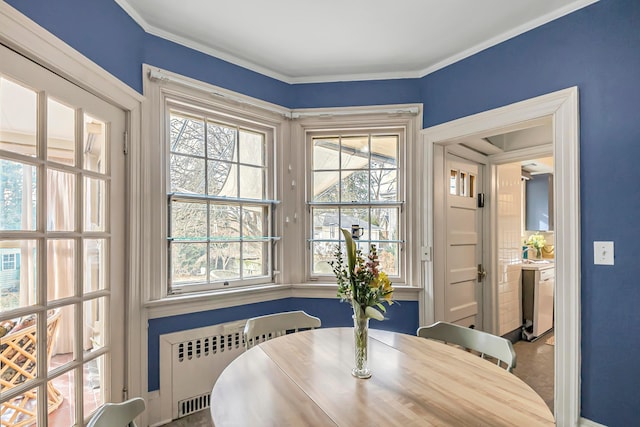 dining room featuring radiator heating unit