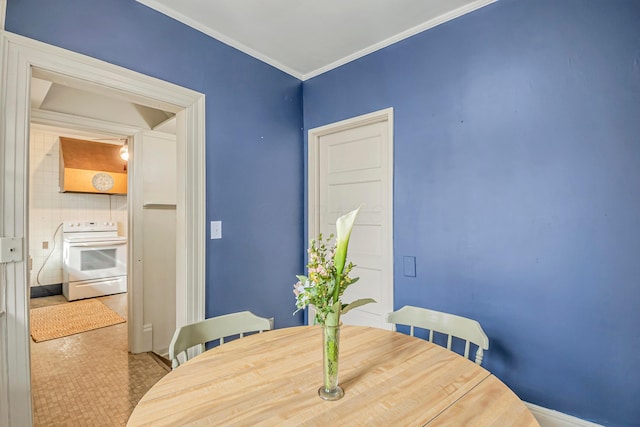 dining room featuring ornamental molding