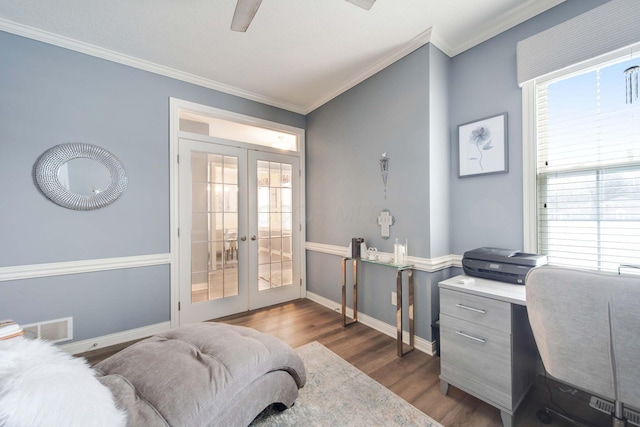 interior space with crown molding, dark wood-type flooring, and french doors