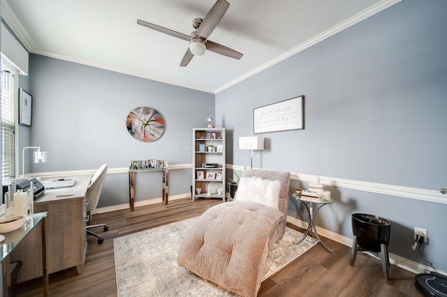 office with wood-type flooring, ornamental molding, and ceiling fan