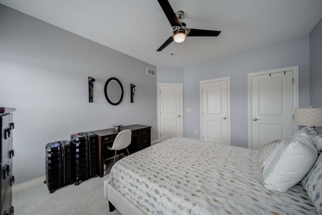 bedroom with light carpet and ceiling fan