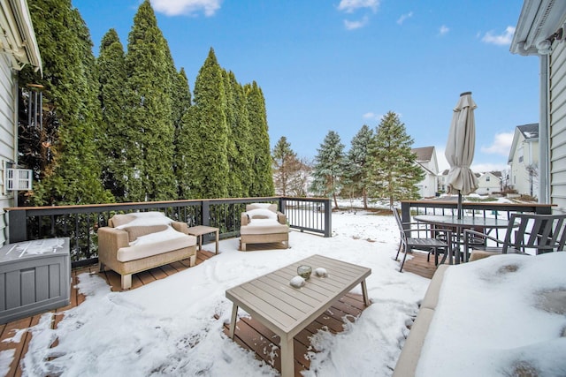 view of snow covered deck