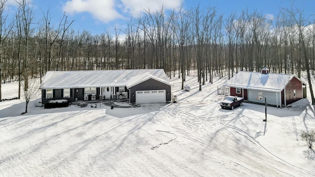 single story home featuring a garage