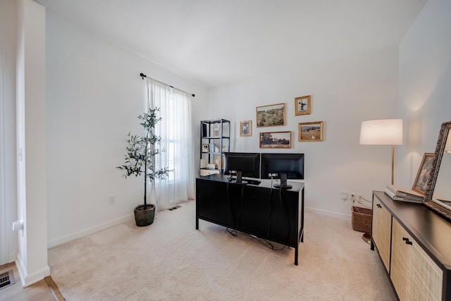 home office featuring light carpet