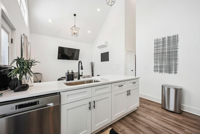 kitchen featuring dishwasher, high vaulted ceiling, pendant lighting, white cabinets, and sink