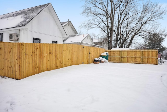 view of yard covered in snow