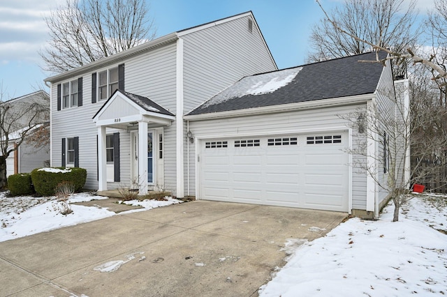 view of front of house with a garage