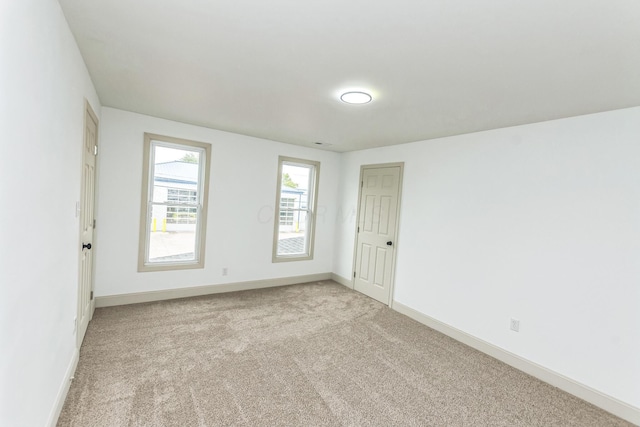 view of carpeted spare room