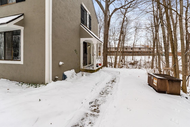 view of snow covered property