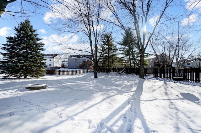 view of yard covered in snow