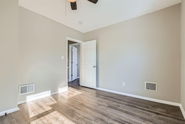 unfurnished room with hardwood / wood-style flooring and ceiling fan