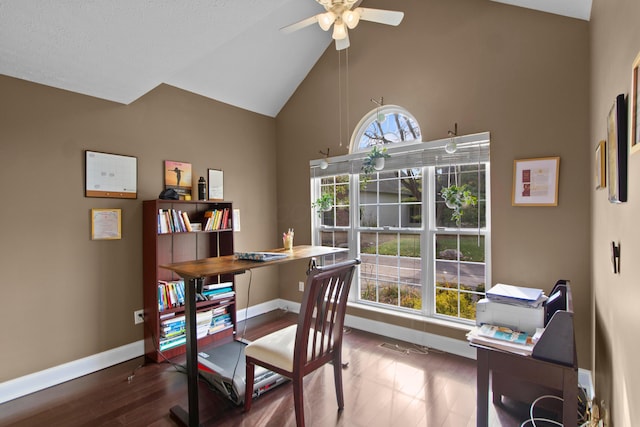 office with ceiling fan and high vaulted ceiling