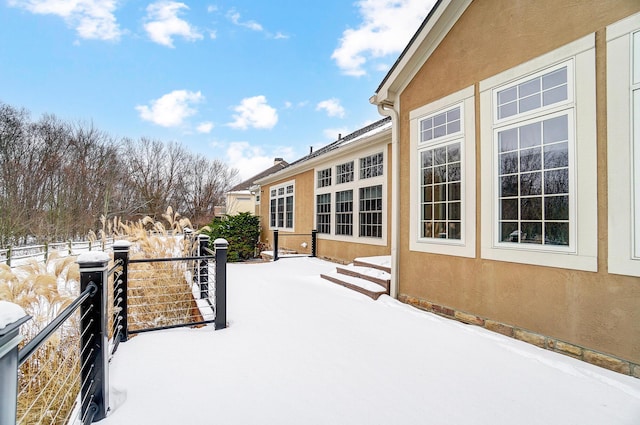 view of yard layered in snow