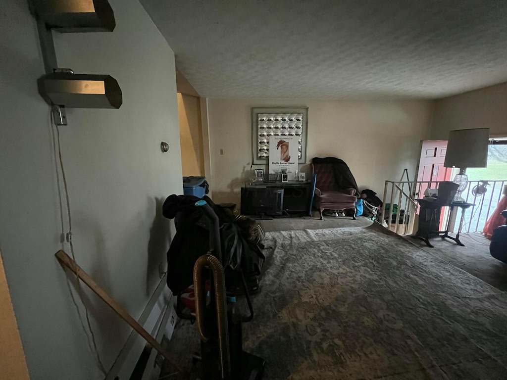 interior space featuring a textured ceiling