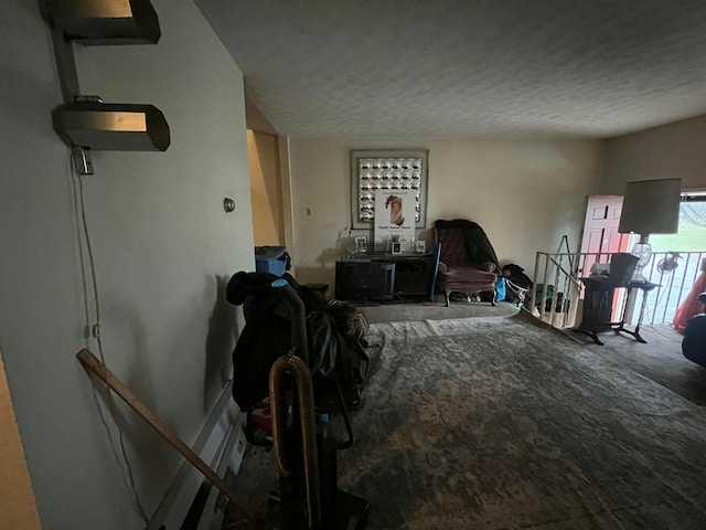 interior space featuring a textured ceiling