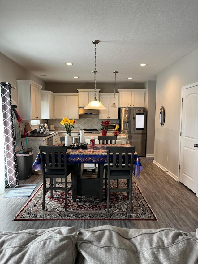 dining room featuring dark hardwood / wood-style floors