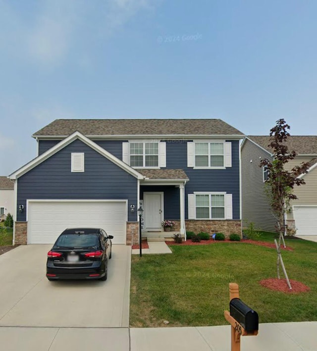 view of front facade with a front yard