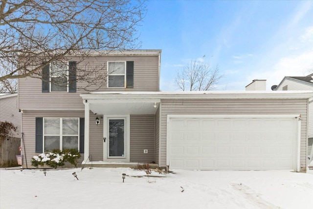 view of front of property featuring a garage