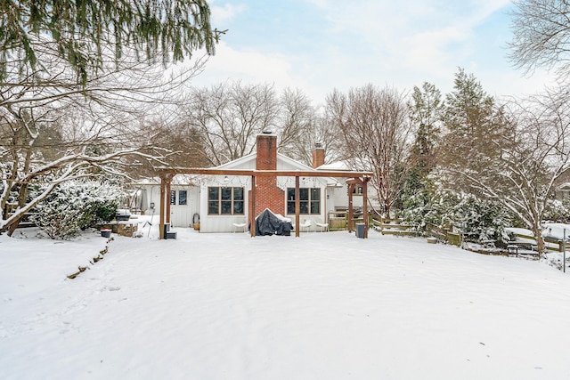 view of snow covered property