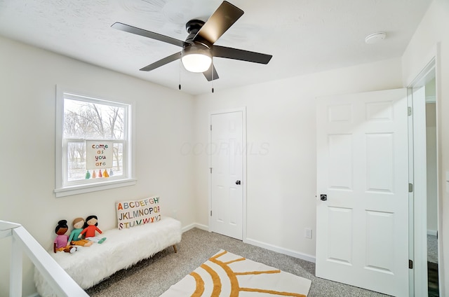 bedroom featuring carpet and ceiling fan