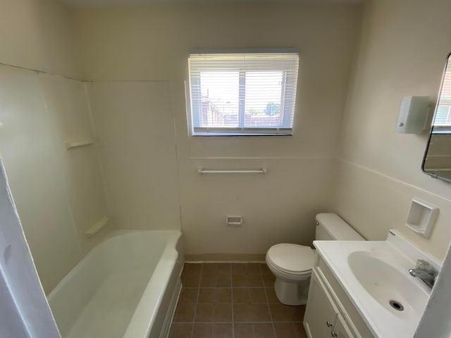 full bathroom with tile patterned floors, vanity,  shower combination, and toilet