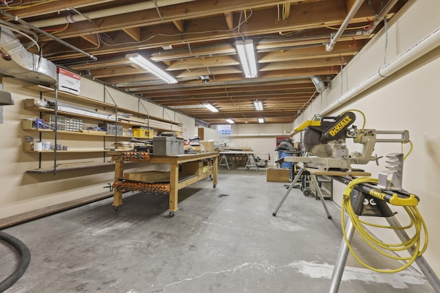 basement with a workshop area