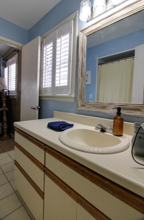 bathroom featuring vanity and tile patterned floors