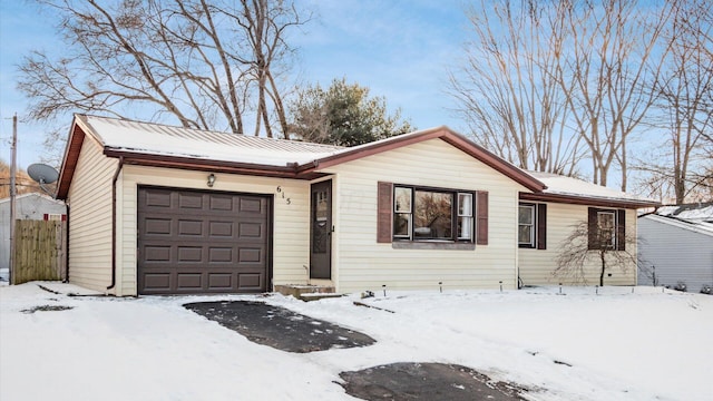 single story home with a garage