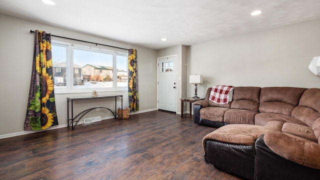 living room featuring dark wood-type flooring