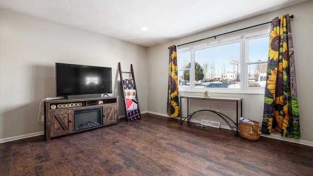 living room with dark wood-type flooring