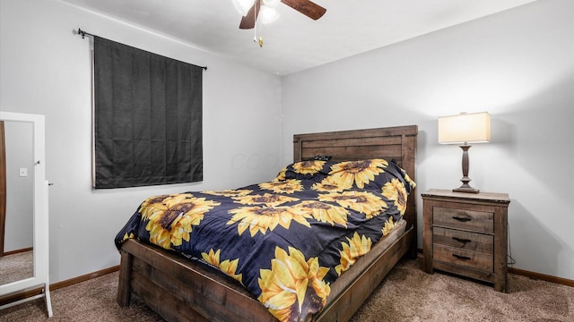 bedroom featuring ceiling fan and dark colored carpet