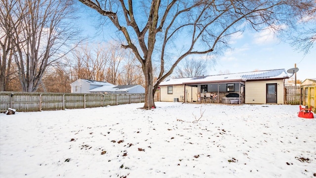 view of yard covered in snow